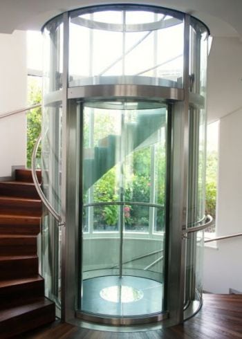 Circular Glass Lifts made by GBH Design in Germany