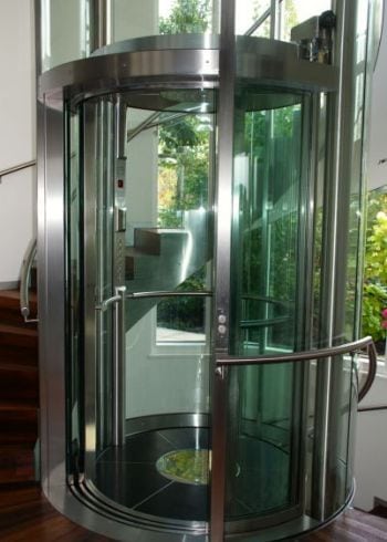 Circular Glass Lifts made by GBH Design in Germany